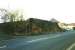 Remnants of the Paisley & Barrhead District Railway photographed in the Summer of 2004. The northern abutment of the bridge that carried the line over Barshaw Drive, Paisley, since demolished to make way for a road and new housing.<br><br>[Colin Miller //2004]