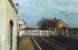 A quiet Easter Saturday morning at Thorpe Culvert station on the Skegness Branch looking past the level crossing and signal box towards Firsby. <br><br>[Mark Bartlett 02/04/1994]