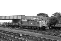 37113 brings a short freight through Burton Salmon Junction from the Castleford direction on 15 August 1980. The lines in the foreground turn south towards Sheffield.<br><br>[Peter Todd 15/08/1980]