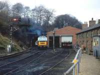 A preserved class 35 <I>Hymek</I> at the south end of Grosmont tunnel alongside one of the shed buildings in February 1982. The old railway cottages have since been demolished.<br><br>[John McIntyre /02/1982]