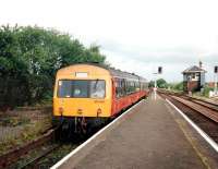 101691 eases into the bay platform at Barrhead on 3 July 1997 with a service from Glasgow Central.<br><br>[David Panton 03/07/1997]