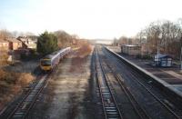 Low winter sun as a Blackpool to Manchester Airport service takes the Up Fast line through Kirkham and Wesham.  185129 is passing the site of Kirkham station signal box, which is the reason for the fast line deviation. The four lines become two again just round the corner.  View east towards Salwick.<br><br>[Mark Bartlett 06/01/2009]