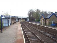 Contrast in architectural styles at Bentham with a traditional Midland Railway shelter on the Carnforth platform and the flat roofed main station building on the Skipton side. View eastwards towards Clapham and Settle Junction.<br><br>[Mark Bartlett 15/12/2008]