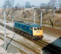 BR class 83 locomotive no 83012 (formerly AL3 no E3035) at the south end of Kingmoor Yard in 1984. One of 5 prototype classes (81-85) commissioned by BR for evaluation as part of the development of a standard AC electric locomotive, 15 of the class were built at the English Electric Vulcan Foundry in the early 1960s. Withdrawn by BR in 1989, no 83012 has since been preserved by the <I>AC Locomotive Group</I> at Barrow Hill.   <br>
<br><br>[Colin Alexander //1984]