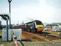 An Aberdeen bound GNER 125 accelerates away from Dundee over Camperdown level crossing on 17 July 1999. <br><br>[David Panton 17/07/1999]