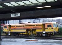 A Colas Rail tamper at Preston awaiting signals to join the main line to the South<br><br>[Graham Morgan 07/01/2009]