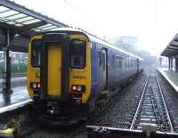 Looking south at Preston station, 156424 is stabled at Platform 4B, one of the southern bay platforms.<br><br>[Graham Morgan 07/01/2009]