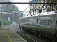 Looking South along Platform 7 of Preston station, with 390027 on a Euston sevice at 6. The south end of Platform 7 still curves to the East from the days when 6 and 7 served the East Lancs lines. These were the only platforms under the main station roof that handled these services. The three other East Lancs platforms were closed in 1972 and that area is now covered by a shopping centre [see image 18734] <br><br>[Graham Morgan 07/01/2009]