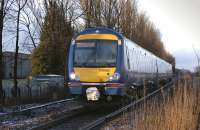 170 460 nears Blackgrange level crossing with a Glasgow Queen Street - Alloa service on 20 January.<br><br>[Bill Roberton 20/01/2009]