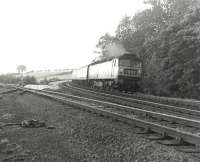 Brush Type 4 D1856 brings the up Royal Scot through the loops at Eamont Bridge in September 1967, passing the site of the former junction for the Keswick/Workington line.<br>
<br><br>[Colin Miller 25/09/1967]