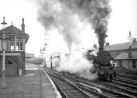 Stanier Black 5 no 45478 on a lengthy double-headed up freight passing Carstairs no 3 box in the 1960s with the shed on the right. The second locomotive in the train has been almost obliterated from the photograph by smoke and steam.<br><br>[Robin Barbour Collection (Courtesy Bruce McCartney) //]