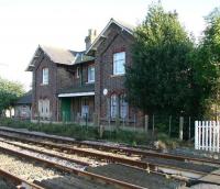 The former York and North Midland Railway station at Heslerton seen on 2 October 2008 looking south east over the level crossing. The 1845 station closed as long ago as 1930 although the station clock still survives... not that passengers on today's passing First TransPennine 185 services running between York and Scarborough have much chance to notice it.  <br><br>[John Furnevel 02/10/2008]