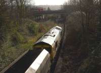 A fully loaded coal train from Portbury import terminal heads east towards Bristol through the platforms of the former Ashton Gate station on 22 January 2009, hauled by Freightliner locomotive 66585.<br><br>[Peter Todd 22/01/2009]