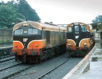 CIE 055 pulls up with a freight on the middle road at Drogheda in 1993, while on the right locomotive 124 prepares to leave with a train for Dublin Connolly.<br><br>[Bill Roberton //1993]