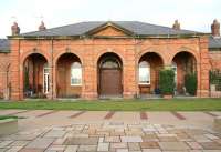 The impressive arched portico that once formed the main entrance to the Hull & Hornsea Railway's 1864 Hornsea terminus on the Yorshire coast. The refurbished former station, a grade 2 listed building, now serves as residential accommodation. <br><br>[John Furnevel 01/10/2008]