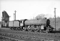 For a period during 1966 Dunfermline shed was home to 6 Thompson class B1 4-6-0 locomotives, one of which, no 61180, is seen near the ash handling plant in the summer of that year. This particular example, a 1947 product of the Vulcan Foundry, had only one more year to go, being withdrawn by BR in May of 1967 and cut up at MM&S Wishaw three months later. <br>
<br><br>[Robin Barbour Collection (Courtesy Bruce McCartney) //1966]
