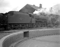 Eastfield Black 5 no 44996 on shed at Fort William in August 1960. The locomotive met its end at Shipbreaking Industries, Faslane, in 1964, lasting some 2 years longer than the old shed itself, which was officially closed in June of 1962 and subsequently demolished. A supermarket now stands on the site. <br><br>[Robin Barbour Collection (Courtesy Bruce McCartney) 30/08/1960]