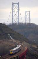 With a light haze hanging over the Forth, a southbound First ScotRail 170 commuter service crosses Jamestown Viaduct bound for Edinburgh on 29 January 2009. <br><br>[Bill Roberton 29/01/2009]