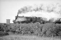 B1 4-6-0 no 61140 has just cleared Jamestown Viaduct as it heads for the Forth Bridge in the 1960s.<br><br>[Robin Barbour Collection (Courtesy Bruce McCartney) //]