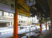 The station at Brig comprises a main area shared by the standard gauge BLS and SBB (see Michael Gibb images 17502 & 17503) plus two platforms located alongside the street used by the metre gauge Matterhorn Gotthard Railway (formed by the merger of the Brig, Visp & Zermatt and Furka Oberalp Railways). This August 1998 view of the MG platforms was taken from a reversing train and looks towards the main station entrance in pre-merger days.<br>
<br><br>[Fraser Cochrane /08/1998]