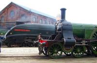 Contrasting front ends at Doncaster Works open day on 27 July 2003, as Stirling Single no 1 poses in front of Gresley A4 Pacific no 60009 <I>Union of South Africa</I>.<br><br>[Colin Alexander 27/07/2003]