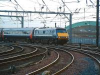 NXEC 91107 comes off the King Edward Bridge and round the curve into Newcastle Central on 31 January with a service from the south.<br><br>[Colin Alexander 31/01/2009]