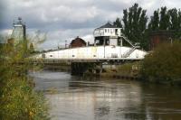 View north west along the River Ouse beyond Selby swing bridge towards the town centre on 29 September 2008. Selby station stands just off picture to the left. The bridge, which carried the ECML prior to the rerouting in 1983, is now used by trains on the Hull line.<br><br>[John Furnevel 29/09/2008]