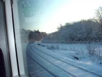 Grab shot of the snowy conditions in the cutting at the eastern end of Standedge Tunnel taken from a Transpennine Class 170 on a Manchester to Hull service. The snow is just above the rails of the loop but all trains that morning were running normally.<br><br>[Mark Bartlett 03/02/2009]