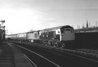 26006+27004 bringing a northbound train into Dundee in November 1981.<br><br>[Peter Todd 16/11/1981]