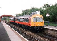 Having crossed over and run back into the southbound platform at Cumbernauld, 101 689 prepares to set out on the return journey to Motherwell in August 1997. <br><br>[David Panton /08/1997]