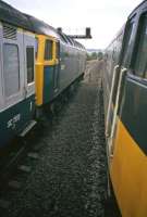 A rush hour tail back just west of Croy in September 1988. The 17.25 Glasgow Queen Street - Aberdeen push-pull service is held at a red alongside the 17.14 Glasgow - Edinburgh service (led by 47 524) that has been side-lined. The cause of the jam is the 17.03 Glasgow - Dunblane service, its worn-out DMU stock then notorious for either not keeping to time or (as in this case) breaking down.<br><br>[Mark Dufton /09/1988]