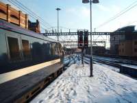 <I>That's far enough.</I> 91117 has arrived at the eastern end of Leeds station on one of the twice hourly NEEC services from Kings Cross and will soon return. Although the wires continue they only go to Neville Hill Depot as the short missing link to the ECML south of York has still not been electrified. <br><br>[Mark Bartlett 03/02/2009]