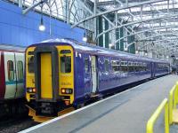 156494 at Platform 14 of Glasgow Central on 9th February. This is the first Class 156 that was in SPT colours to be repainted in the new ScotRail blue, and is currently awaiting its new branding to be put in place<br><br>[Graham Morgan 09/02/2009]