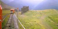 Two trains on the ParsennFunicular Railway in Davos meet at the loop on the upper half of the line in August 1998. <br><br>[Fraser Cochrane /08/1998]