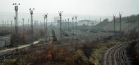 The northern portion of Tinsley Marshalling Yard remained open in 2004. It has since been rationalised to a few relaid sidings on the extreme north of the site.<br><br>[Ewan Crawford 23/11/2004]