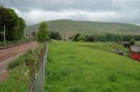 Looking north to the former Crawford station. The trackbed to the right led to and was used in the construction of Camps Reservoir.<br><br>[Ewan Crawford 06/06/2004]