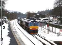 A snow scene, with the returning empty Tesco containers from Inverness to Grangemouth passing through Pitlochry on 13 February behind DRS 66412, with a dead class 37 behind the train locomotive. Thanks to John Gray for the tip.<br><br>[Brian Forbes 13/02/2009]