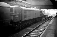 E27006 <I>Pandora</I>, one of the seven class EM2 1.5kV DC Co-Co electrics built in 1953/4 to haul passenger trains over the Woodhead route. The locomotive is shown about to leave Sheffield Victoria station (closed 1970) for Manchester in the 1960s. Following the introduction of significant speed restrictions on the Woodhead route, coupled with the BR decision to adopt 25kV AC as the preferred electrification option, the class was withdrawn in 1968 and sold to Dutch Railways, where they became the NS1500 class, operating out of Maastricht depot. They performed as regulars for many years on the Den Haag - Koln express services as far as the German border, as well as on freights originating in the Rotterdam area. <I>Pandora</I> was withdrawn by NS in 1985 and the last of the class the following year.  <br>
<br><br>[Robin Barbour Collection (Courtesy Bruce McCartney) //]