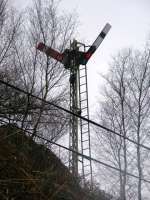 View from the roadside of the stone signals at the Pass of Brander. Should a rock fall occur then a series of wires that run along this stretch of line automatically throw the semaphore signals to Danger!! Hopefully averting a disaster!! <br><br>[Colin Harkins 15/02/2009]