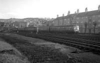Scene at Gourock on 12th March 1966, the last day of semaphore signalling. A DMU is approaching the station with a service from Glasgow.<br><br>[Colin Miller 12/03/1966]