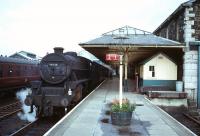 Black 5 44938 sporting a 9D Newton Heath shed plate stands at Windermere platform 2 around 1966.<br><br>[Robin Barbour Collection (Courtesy Bruce McCartney) //1966]