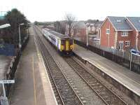 Before Northern Rail finalised its livery it experimented with a number of trial schemes, including this predominantly white livery still carried by 156425 in 2009. This unit is seen pulling into Layton from Blackpool North on a Manchester Victoria service. At the far end of this long straight is the entrance to the still extensive Blackpool Carriage Sidings, which also has a fuelling point.<br><br>[Mark Bartlett 17/02/2009]