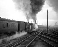 A double-headed freight heads south from Carstairs in the 1960s. Leading locomotive is Black 5 no 45478  with an unidentified 9F in support.<br>
<br><br>[Robin Barbour Collection (Courtesy Bruce McCartney) //]