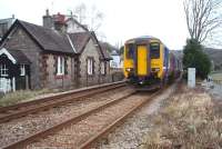 A small foot crossing just west of the station is one of the access points to Grange promenade. 156454, heading for Carlisle via the coast, passes the former crossing keeper's cottage, now in private ownership.<br><br>[Mark Bartlett 21/02/2009]