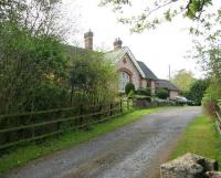 Looking north along the former station approach to Little Salkeld on the Settle and Carlisle Line, seen from the main road on 6 May 2006. The station, now a private house, closed to passengers in 1970. [See image 59115]<br><br>[John Furnevel 06/05/2006]