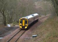 A Perth - Edinburgh service  passing through Collessie Den on 23 February 2009 formed by unit 158725.<br><br>[Brian Forbes 23/02/2009]