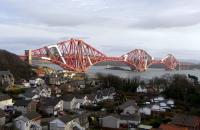 No apologies for another picture of what is already Britain's most <br>
photographed (and famous) railway structure.  From a distance the use of plastic sheeting to enclose the ever-moving scaffolding adds a touch of <I>Lego</I> to the original <I>Meccano</I>. Photographed looking south across the Forth on 22 February 2009.<br><br>[David Panton 22/02/2009]