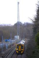 Looking east at Ratho on 25 February with 158 715 passing the former goods yard, now a materials base for electrification. Note that masts have been erected here.<br><br>[Bill Roberton 25/02/2009]