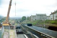<I>Rationalisation</I> work for singling, pre-electrification, underway at Largs in 1986.<br><br>[Colin Miller //1986]