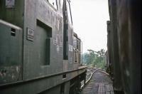 Clayton Class 17 diesels were not a successful design and all but one were scrapped in the 1970s. The escapee was D8568 which was purchased in 1972 by the Hemelite company for use on the Hemel Hempstead - Harpenden line. The loco is pictured here in August 1976 near the Hemelite factory, still in its original BR green livery. On the right is the rake of trucks used to import power station ash for building block manufacture. D8568 moved on to a different industrial use in 1977 and happily survived long enough to be preserved by enthusiasts [see image 34392].<br><br>[Mark Dufton 07/08/1976]